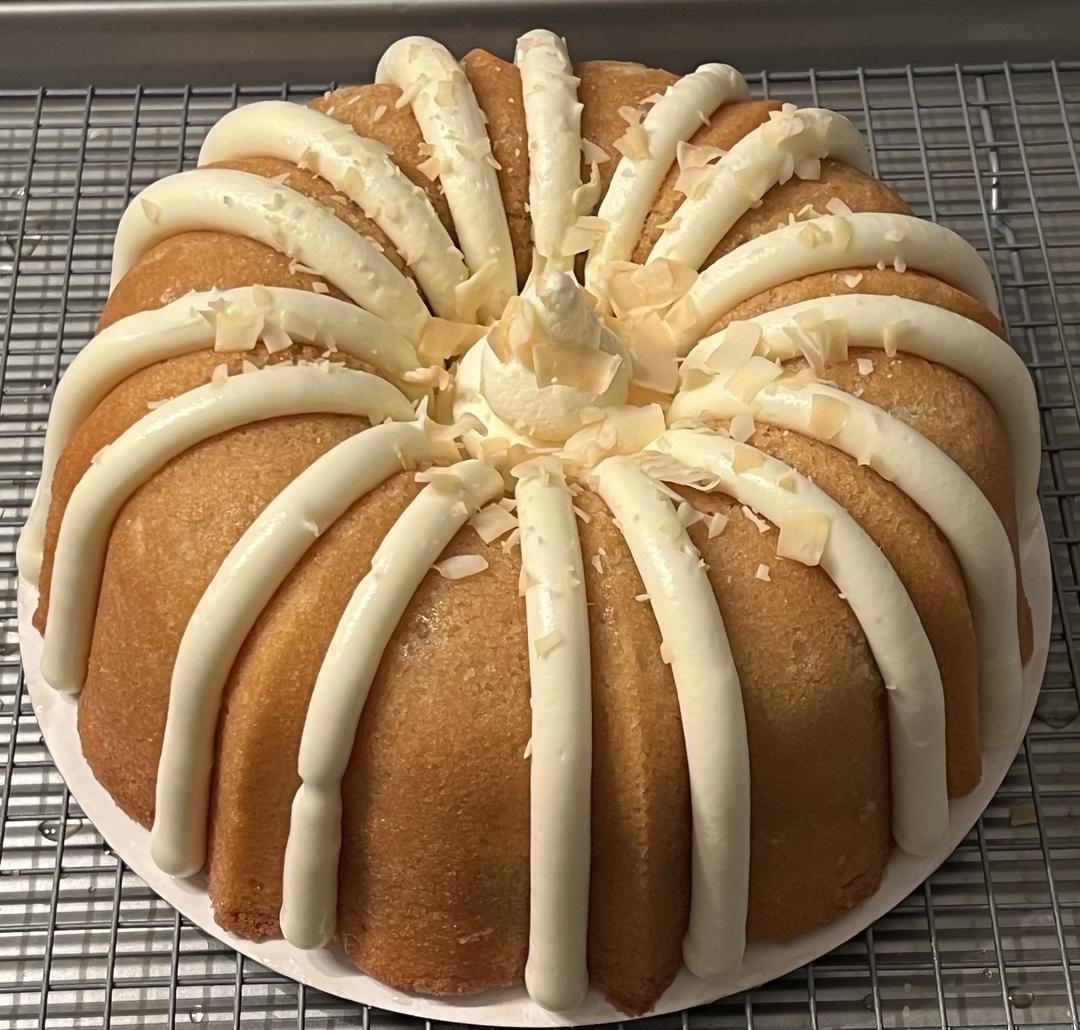 Cream of Coconut Pound Cake with Coconut Cream Cheese Frosting